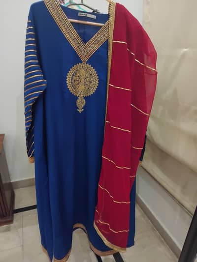 Royal blue Embroidered dress with red Dupatta