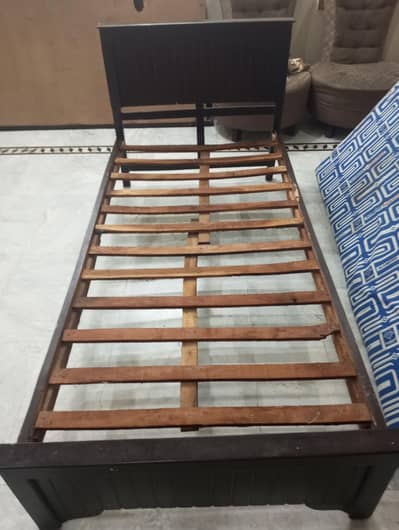 pair of single beds with mattress