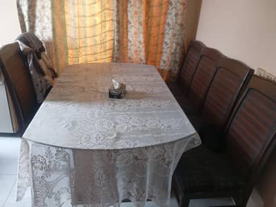 mirror table and 6 chairs available for sale