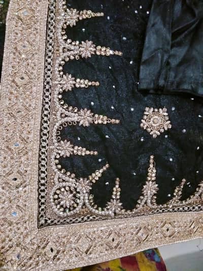 black and golden saree