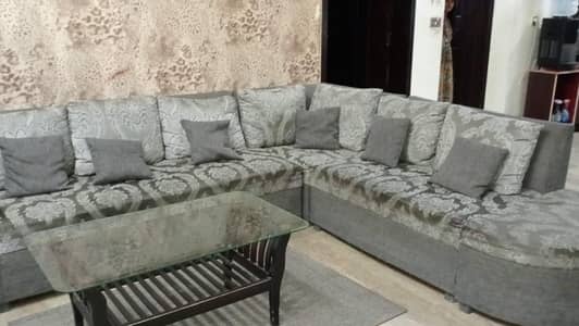 l shape 7seater grey colour sofa with cushions