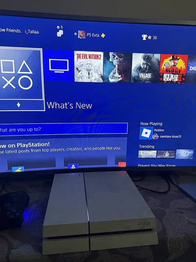 PS4 with 2 Controllers + Games + PS Plus Time Left
