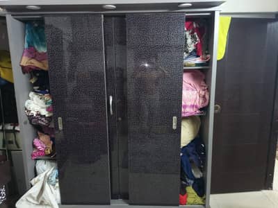 Gray and black theeme sliding door wardrobe and single bed