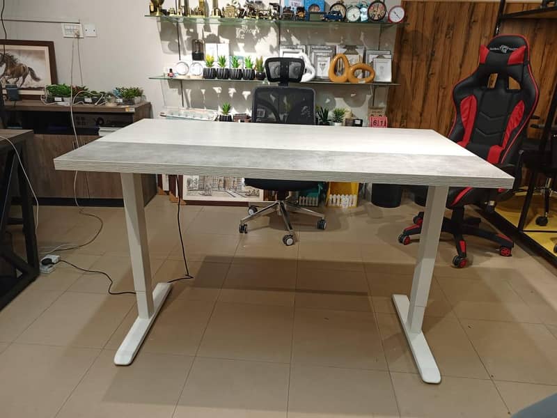 Height adjustable table 10