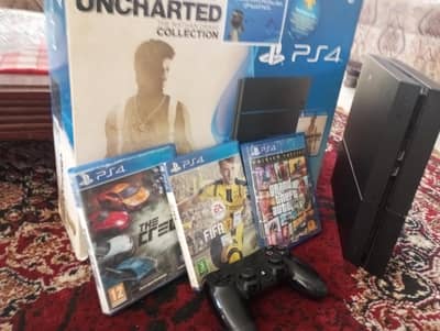 PS4 with three disc games wires and one original controller and a box