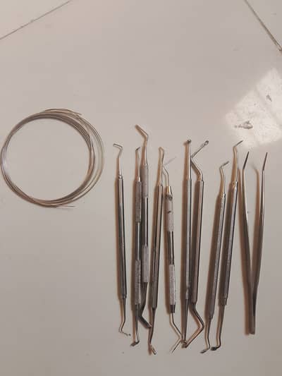 Dental tools + braces wire (new condition)”