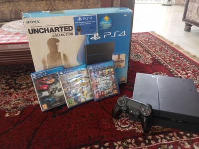 PS4 with three disc games wires box and one original controller