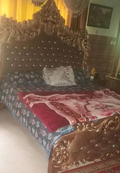 king size bed with dressing table and side table