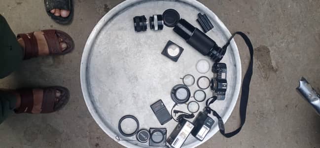 Canon old film camera with all assosries