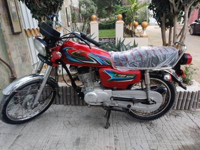 united us 125 model 2023 karachi number