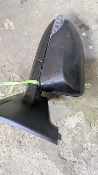 Vitz 2025 Side mirror Available for Sale urgent