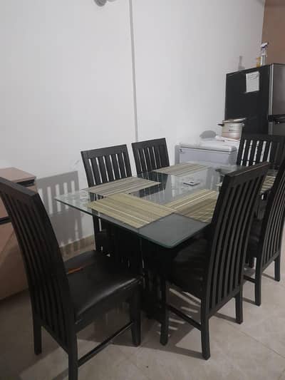 Six seater dining table  with chairs