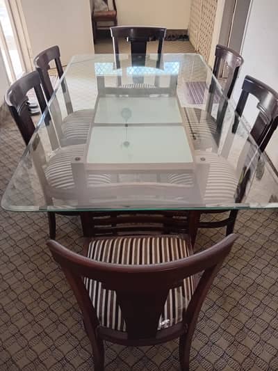 6 seater Dinning chairs with glass top table