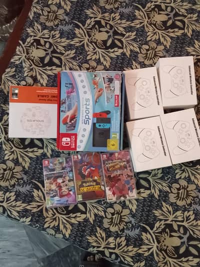 Nintendo switch V1 4 controllers and 3 games for only 44999