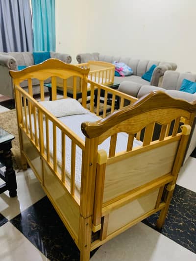 Baby cot with swing