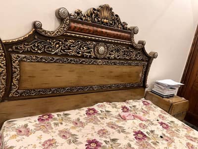 Wooden bed with side tables and dressing