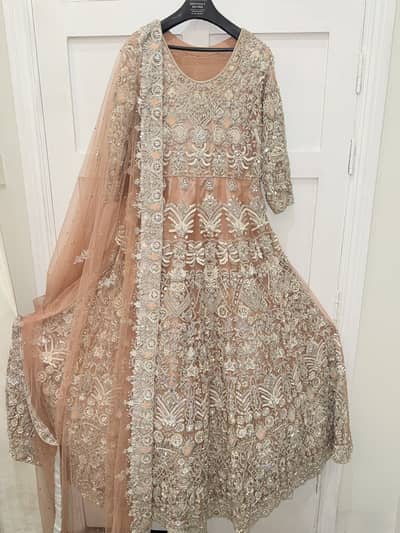 Peach-Gold Heavily Embellished Bridal Lehnga Gown