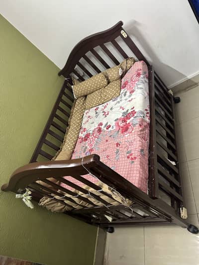 Wooden bed with foam