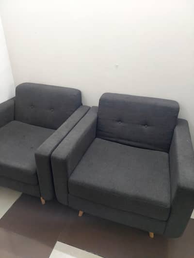2 one seater sofas