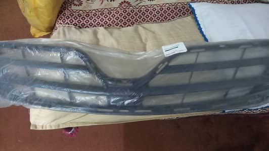 Corolla Genuine front grills and engine shield .