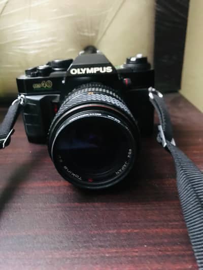 OLYMPUS OM40 PROGRAM