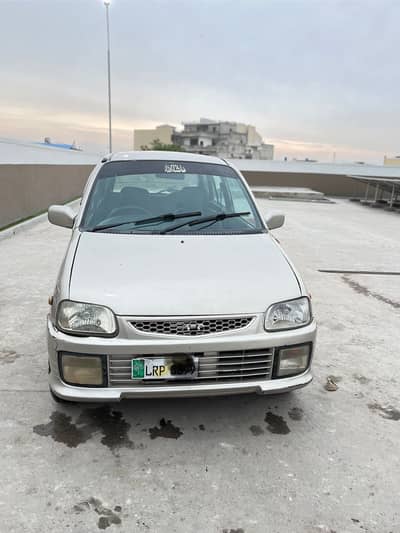 Daihatsu Cuore model 2004 new tryes  Genuine Car