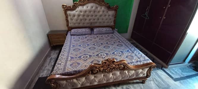 Bed with side table 2 crown chairs and dressing