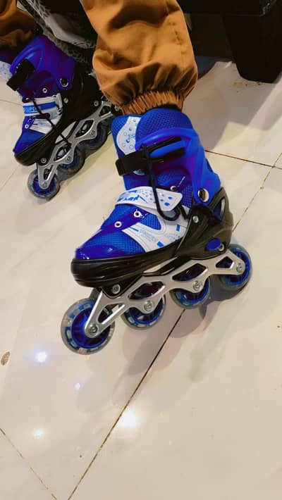 Kids scating shoes. . . used only one time. . .