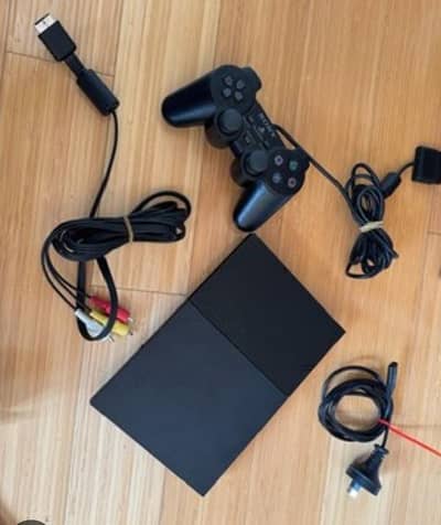 Urgent Sale PS2 Slim + 2 Controllers + 2 Games (Good Condition)