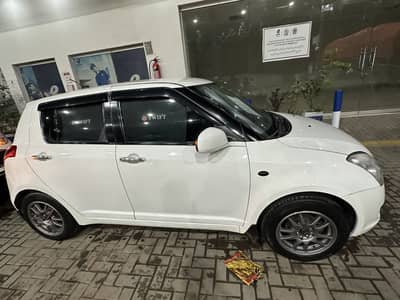 Suzuki swift top of the line DLX variant