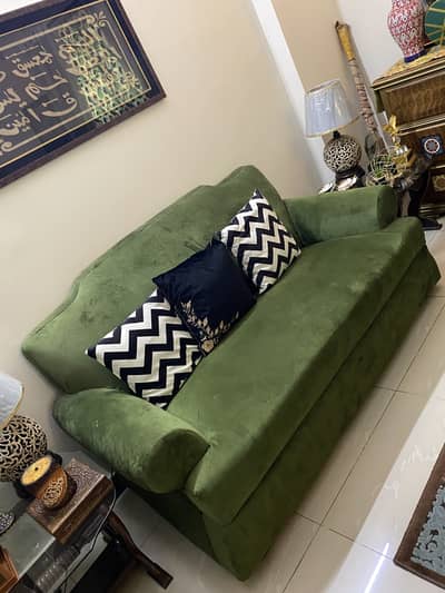 Sofa set with center table and curtains