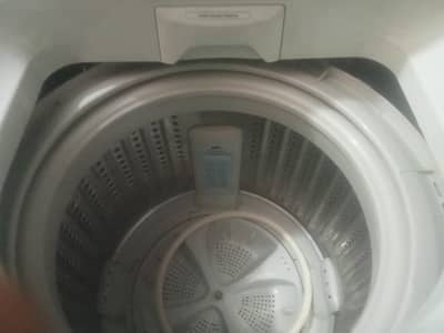 A new unused washing machine of Haier company for sale