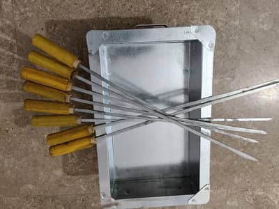 Charcoal Angeethi with Seekhs