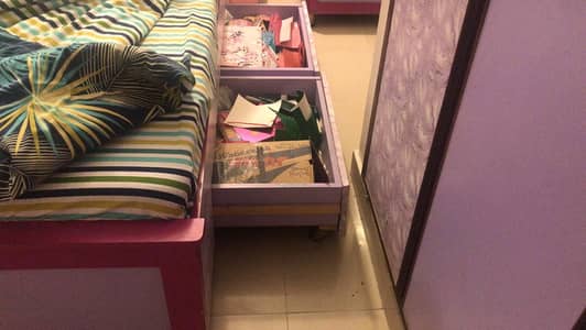 Two kids single bed with side table and two  mattresses