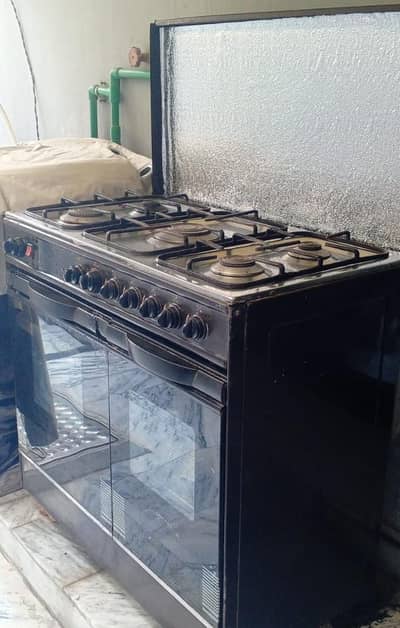 corona brand 5 burners cooking range.