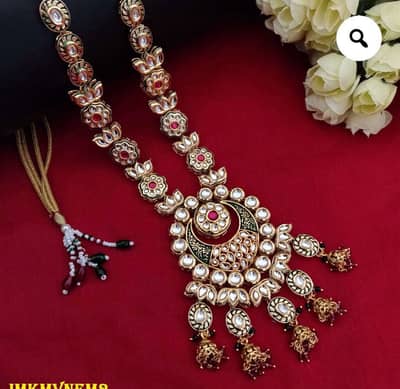 Complete set Bangles in gold and green combination. Made by India.