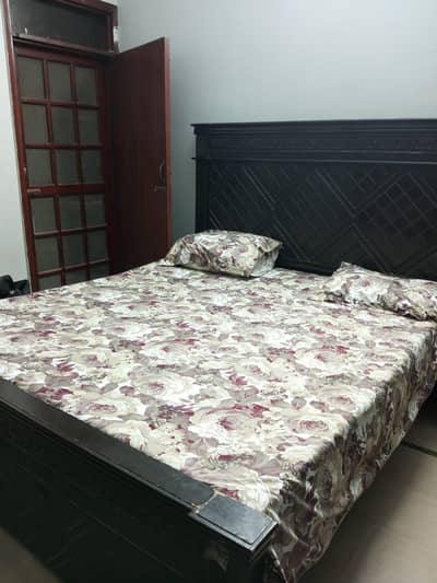 Used wooden king bed with mattress