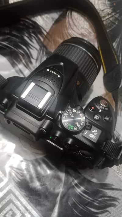 DSLR Nikon d5300 with 18_55 lens with charger and a card and  bag