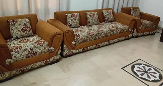 7 seat sofa set and a two seater sethi