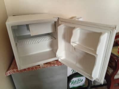 Heir room refrigerator, slightly used.