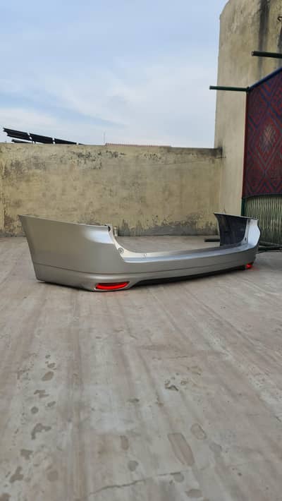 NISSAN WINGROAD REAR BUMPER