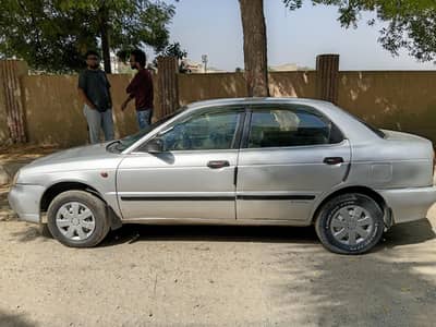Suzuki Baleno 2005 achi gari hai koi kam nahi nikalti