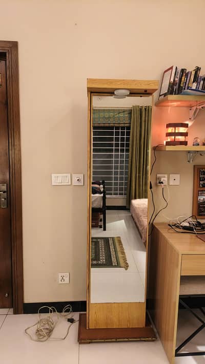 Sliding Mirror with a Shelf Inside and a Light for Sale!