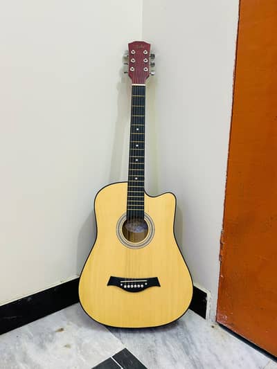 brand new acoustic guitar medium size with complete accessories