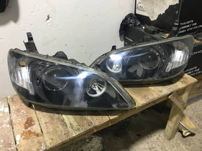 Honda civic 2005 model eagle eye  frent lights sports available