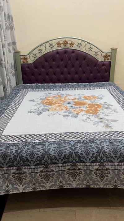 Double bed without mattress.