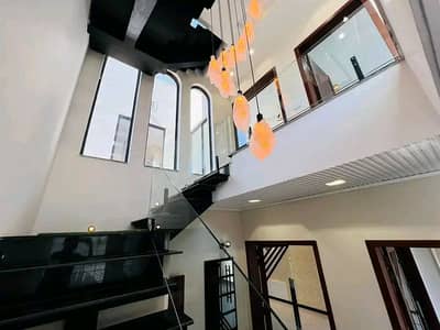 10 Marla Brand New House Available For Rent In Bahria Town Phase 8