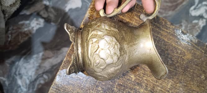 "ANTIQUE PIECE"A 60 YEARS OLD BRASS TEA SET IN GOOD CONDITION. .