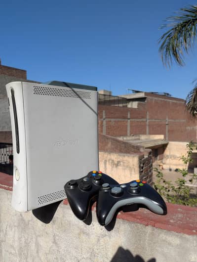 Xbox 360 with two controllers