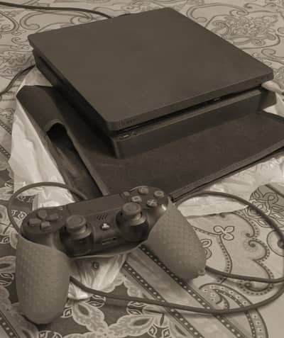 PS4 Slim 500GB (Jet Black) – Pristine Condition